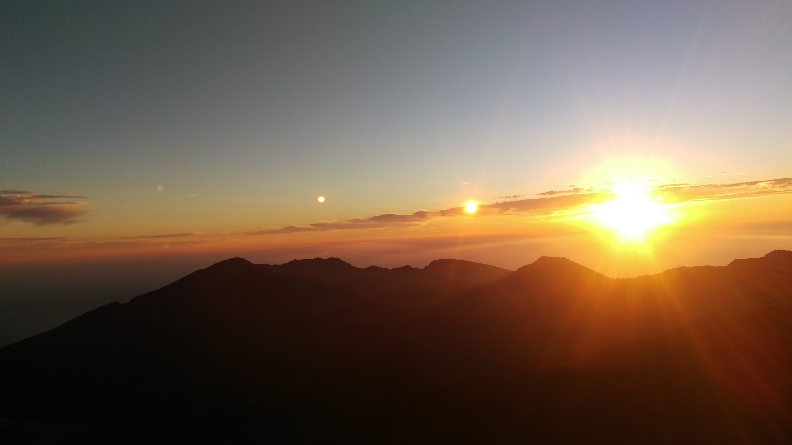 sunset over mountain tops
