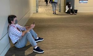 Attendees viewing mobile app